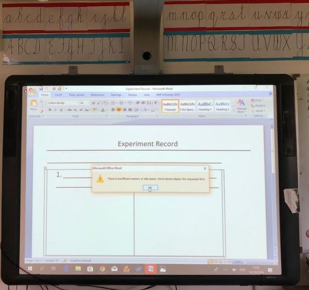 A Promethean interactive whiteboard displaying an experiment.
